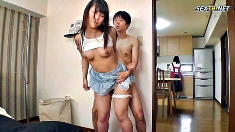 Japanese stepsister exposes breasts in stockings while stepbrother grabs from behind