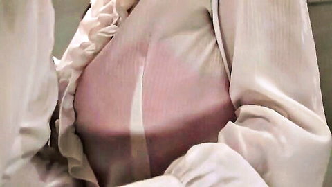 Female boss in low-cut white blouse reveals cleavage on stormy night