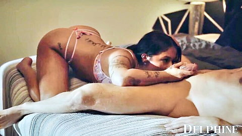 Tattooed brunette babe in pink thong handjobs big erect cock on bed