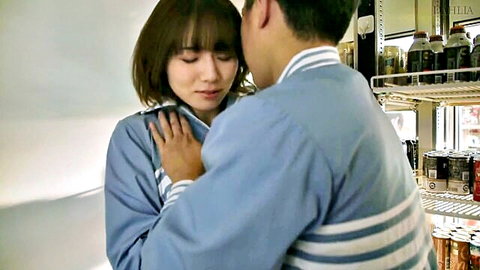 Hot Asian MILF hugged by coworker in blue uniforms at work
