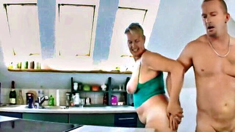 Mature blonde with big tits bent over for muscular man in kitchen sex