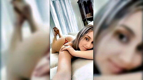 Seductive Indian Punjabi MILF hotwife in red thong and heels posing solo