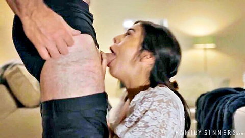 Brunette Asian woman kneeling for intense blowjob on standing man