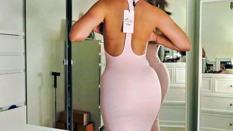 Curvy blonde in tight pink Oh Polly dress, back view tease in haul video