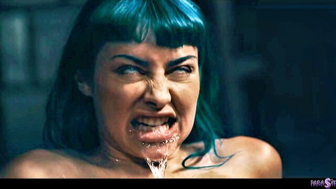 Teal-haired woman expelling liquid from mouth, nude intense expression