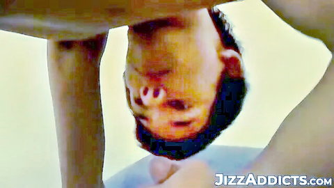 Upside-down POV of bearded short-haired stud getting deepthroated by spread thighs and gripping hand