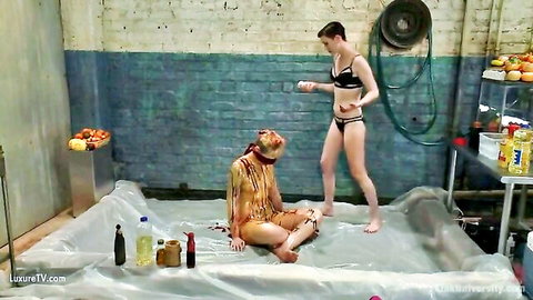 Lesbian duo in lingerie, one babe drenched in messy fluids