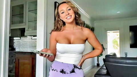 Sassy Scott teasing in POV with cleavage in white tube top and purple pants
