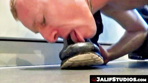 Stan Lacoste licking Kamzouze's black sneaker in gay foot fetish scene