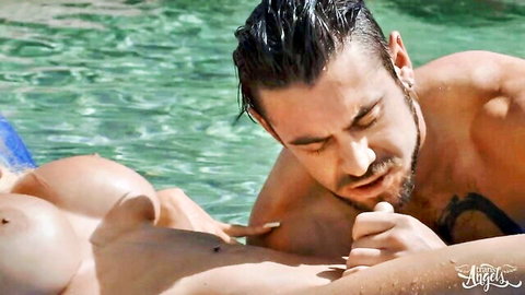 Brittney Kade topless in pool, lover nuzzling her busty curves