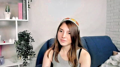Pamilarakestraw shy young brunette camgirl in tank top, teasing feet