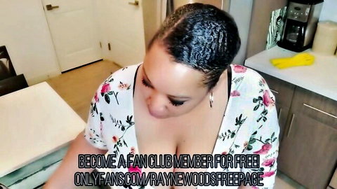 Curvy black BBW in floral dress showing cleavage in kitchen tease