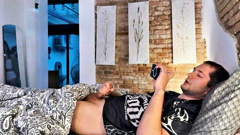Hot stepbrother masturbating in bed while watching steamy content