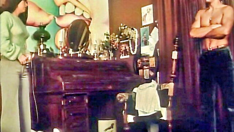 Vintage 1978 couple in green dress and shirtless pose from Happy Holidays porn