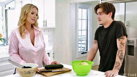 Rachael Cavalli in pink satin blouse flirts with Tyler Cruise in kitchen