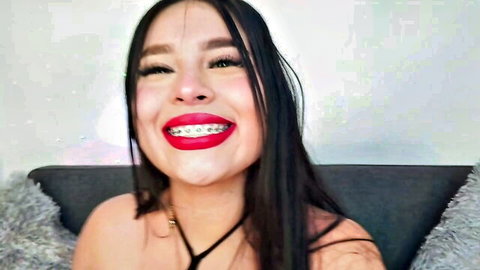 Mia Roux13 Asian camgirl smiling with braces and red lips in sexy thumbnail