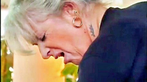 Mature granny with gray hair, neck tattoo, open mouth expression