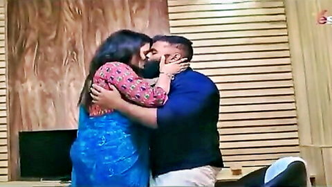 Passionate Indian couple kissing in saree, Malayalam web series foreplay