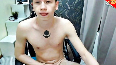 Thomas Gatte slim young man shirtless with chest tattoo in Chaturbate webcam tease