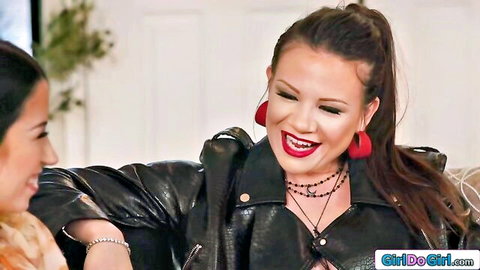 Two smiling women in leather jacket and orange top, former BFFs hinting at lesbian pussy licking