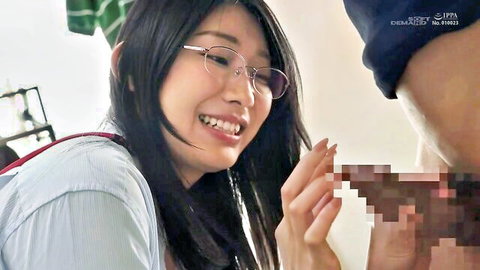 Smiling Japanese woman in glasses gently touching censored cock in JAV deflowering scene