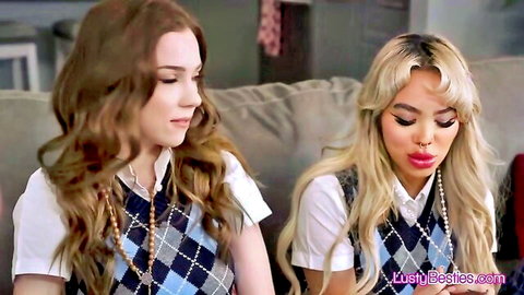 Two busty schoolgirls in argyle vests and pearls teasing for threesome