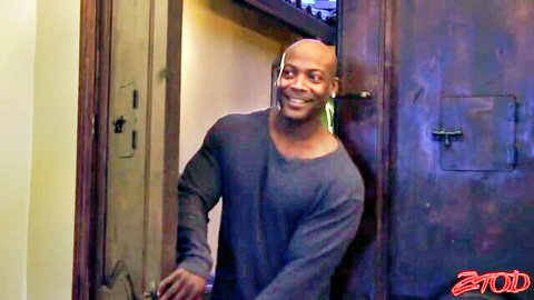 Bald Black man smiling in sweater, Ms Connor cuckold scene thumbnail