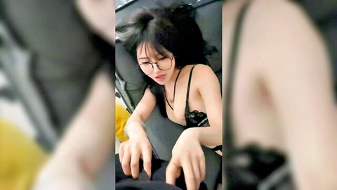 Asian woman in black lingerie giving handjob POV