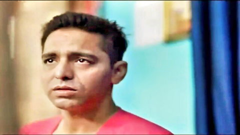 Slim Indian man in pink shirt, thoughtful gaze from Pehredaar Hindi web series