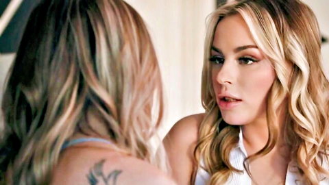 Two blonde women in intimate lesbian strap-on encounter