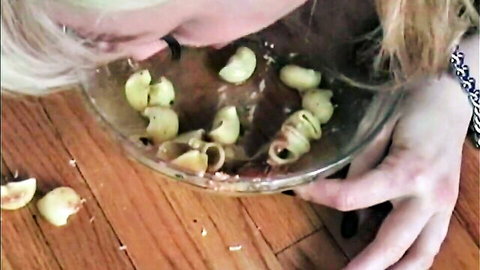 Petal Benson in pet training, blonde petgirl eating from bowl on floor
