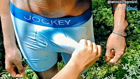 Latino man in blue Jockey underwear with huge bulge touched outdoors by river