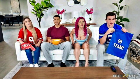 Lily Lou cheers with friends in sexy team jerseys, big tits spilling out in living room scene