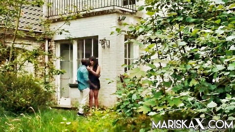 Mariska kissing black stud in sexy short dress outdoors
