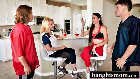 Blonde and brunette women in sporty outfits with two guys in casual mommy exchange scene