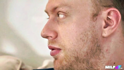 Close-up of fit Caucasian man in profile from British MILF gangbang video