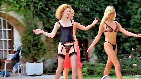 Three busty retro babes in sheer black and pink lingerie teasing seductively outdoors in garden