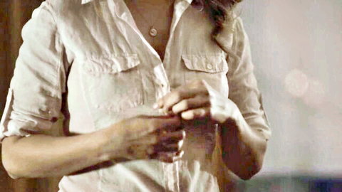 Jennifer Mudge as Debra Whitehead in open white blouse, teasing cleavage