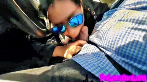Guy in blue sunglasses sucks hard cock in public car blowjob