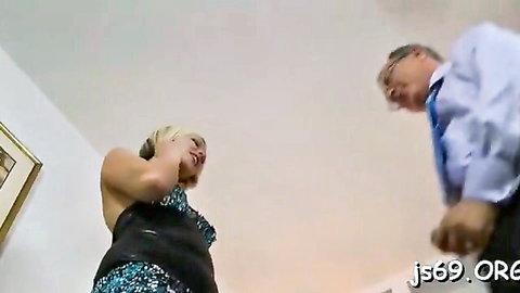 Blonde Anna in sparkly black dress teases suited older man intimately