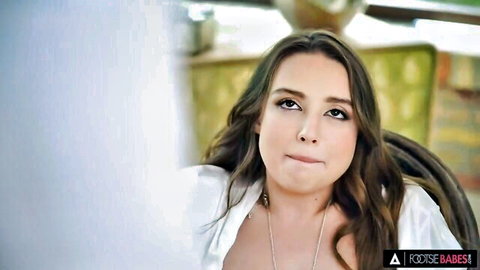 Kylie Green in open white blouse, seductive gaze in FOOTSIE BABES thumbnail