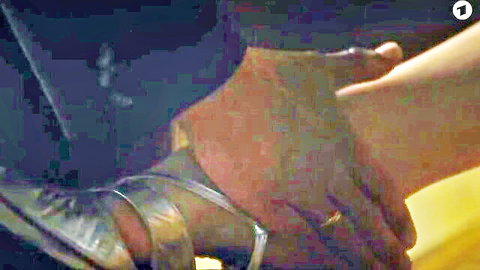 Katja Riemann topless in intimate leg touch scene with silver heels