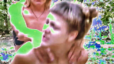 Blonde models Ida and Isabella in intimate outdoor embrace in woods