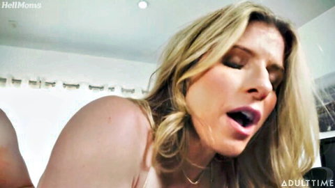 Blonde MILF with mouth wide open moaning in ecstasy closeup