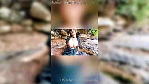 Mintra4444 Thai beauty exposing big tits at outdoor waterfall