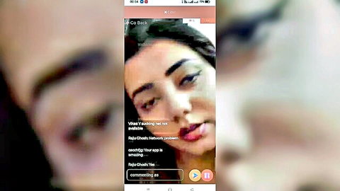 Close-up of sexy brunette woman's plump lips and sultry eyes in live video chat