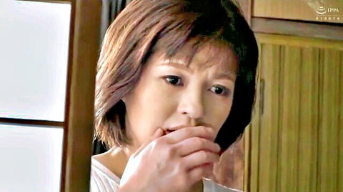 Stunned Japanese mature wife covering mouth in surprise