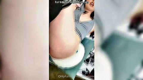 Amateur babe lifts gray top flashing white panties over pussy and thick thighs spread wide