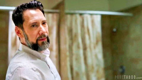 Handsome bearded man in white shirt standing in steamy bathroom ready to fuck