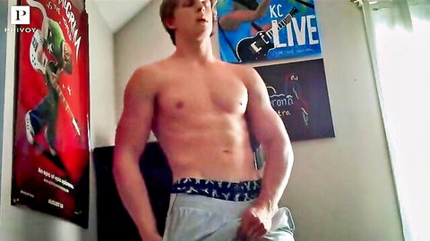 Muscular blonde guy in underwear showing off bulge, solo amateur tease